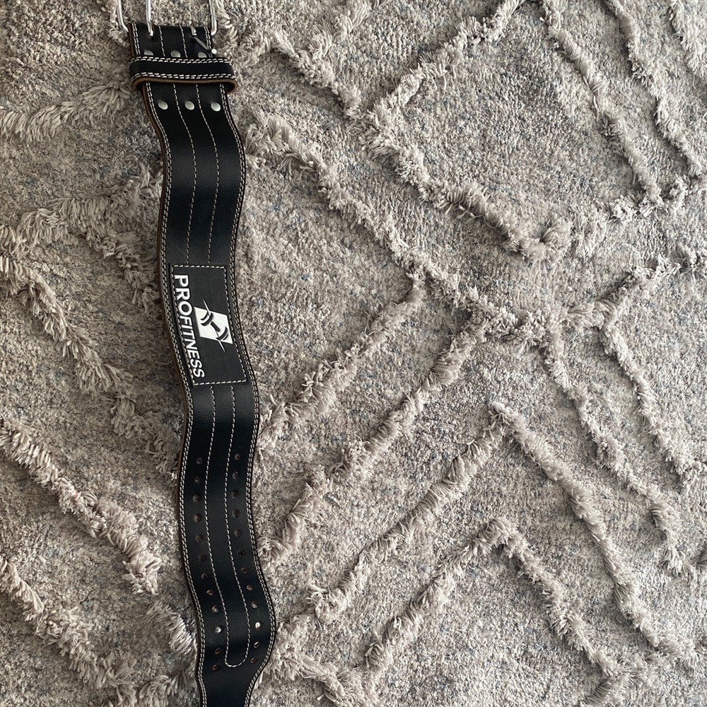 ProFitness Black Leather Gym Belt weight lifting extremely supportive.  Like new